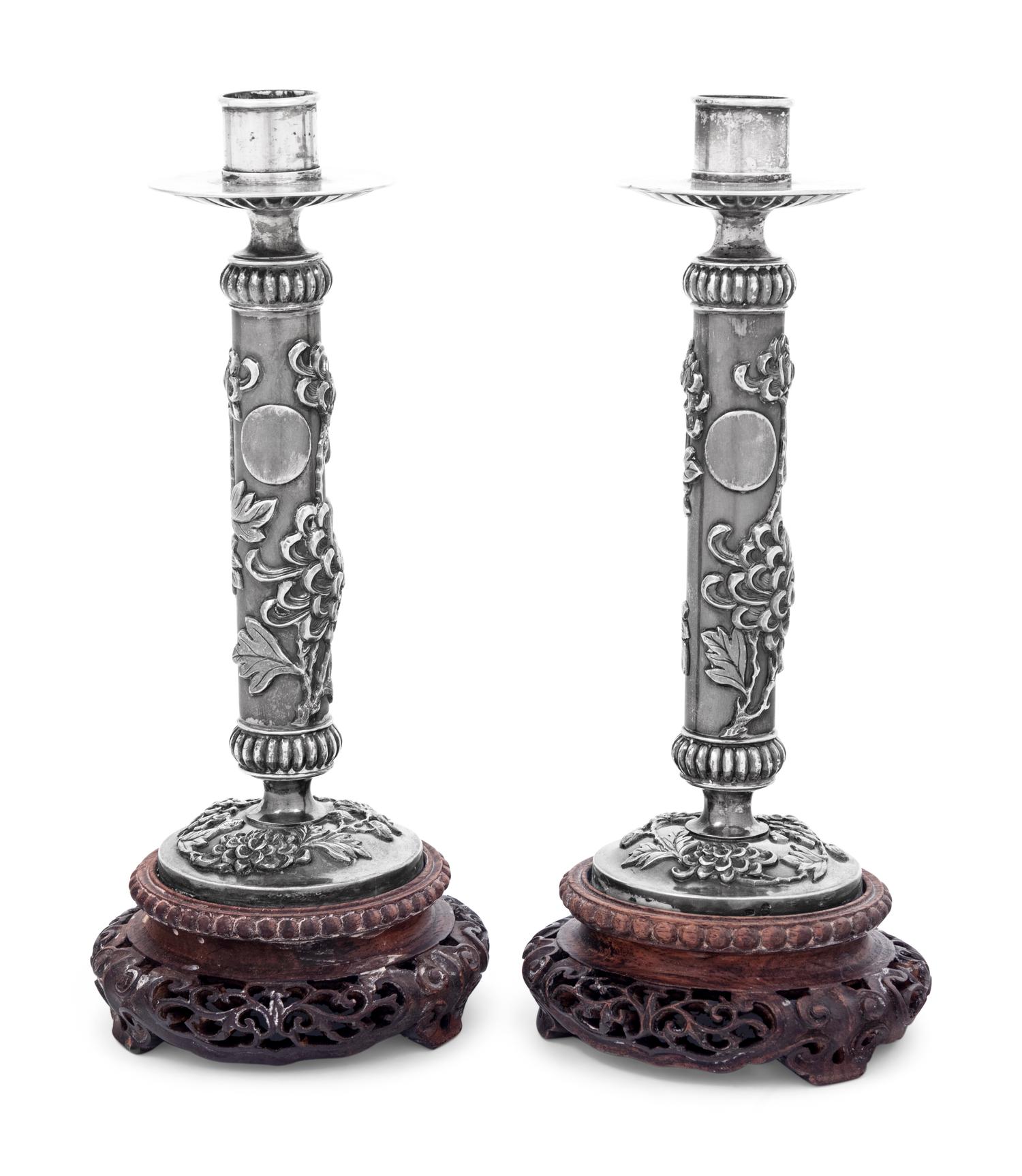 A Pair of Silver Candlesticks