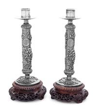 A Pair of Silver Candlesticks