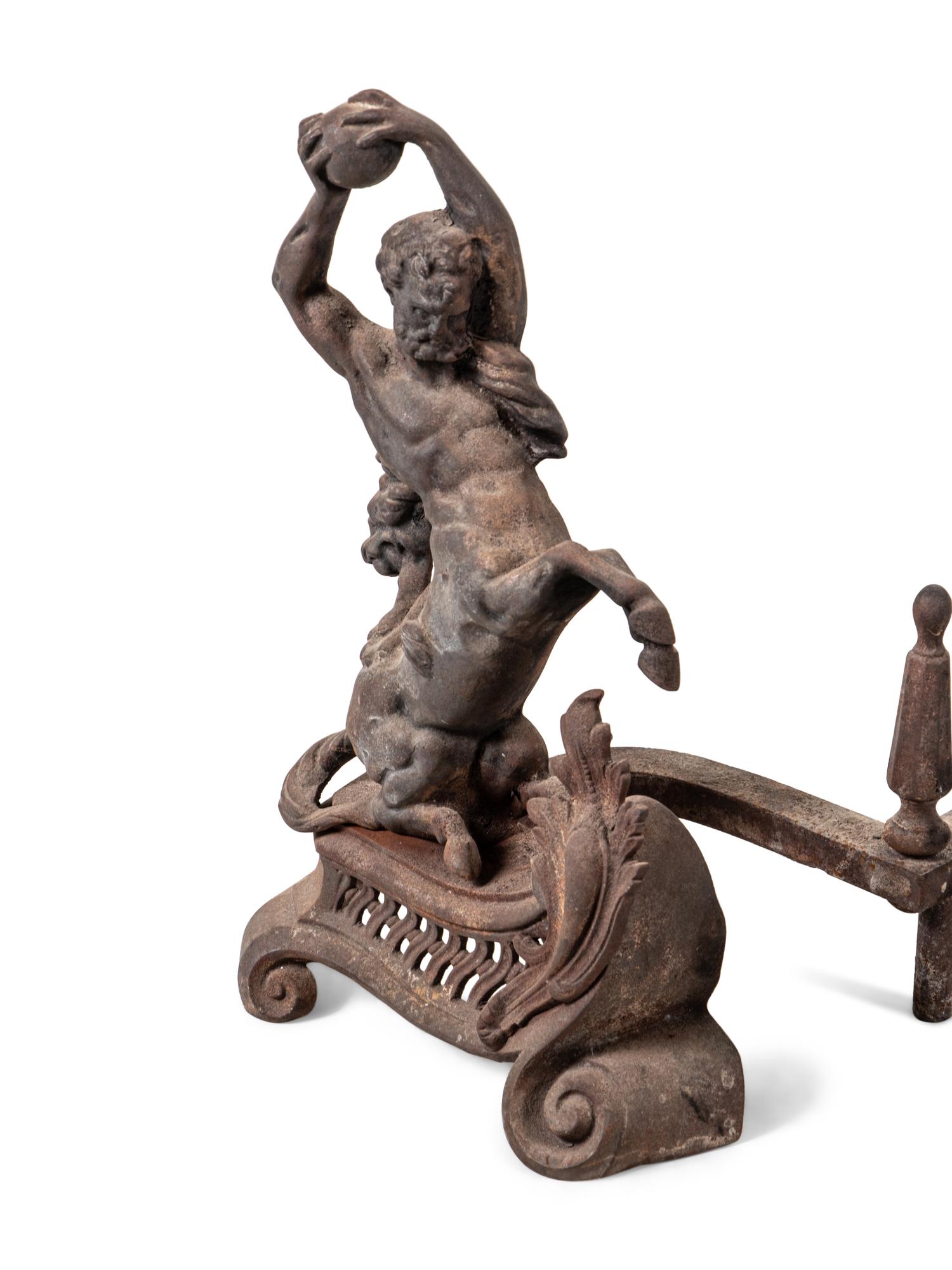 A Pair of Continental Iron Andirons with Hercules and the Nemean Lion