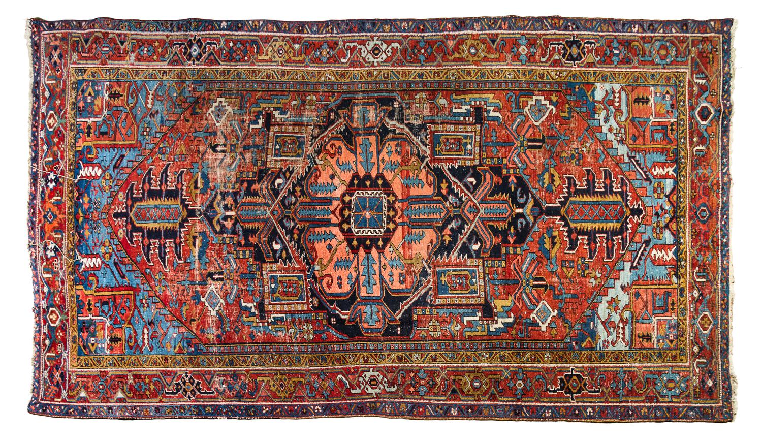 A Heriz Wool Rug 11 feet 10 inches x 7 feet 1 inch. — FIRST HALF 20TH CENTURY