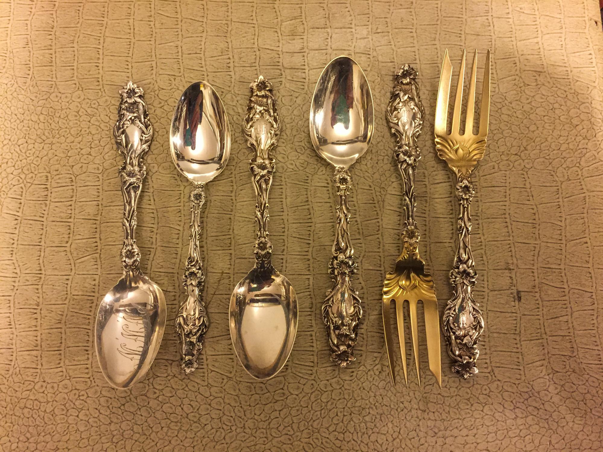 A Group of American Silver Flatware, Whiting Mfg. Co., New York, NY, Lily pattern, comprising: 12 dessert forks 22 teaspoons 3 butter s