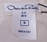 An Oscar de le Renta Cream Silk Blouse, Size 10.