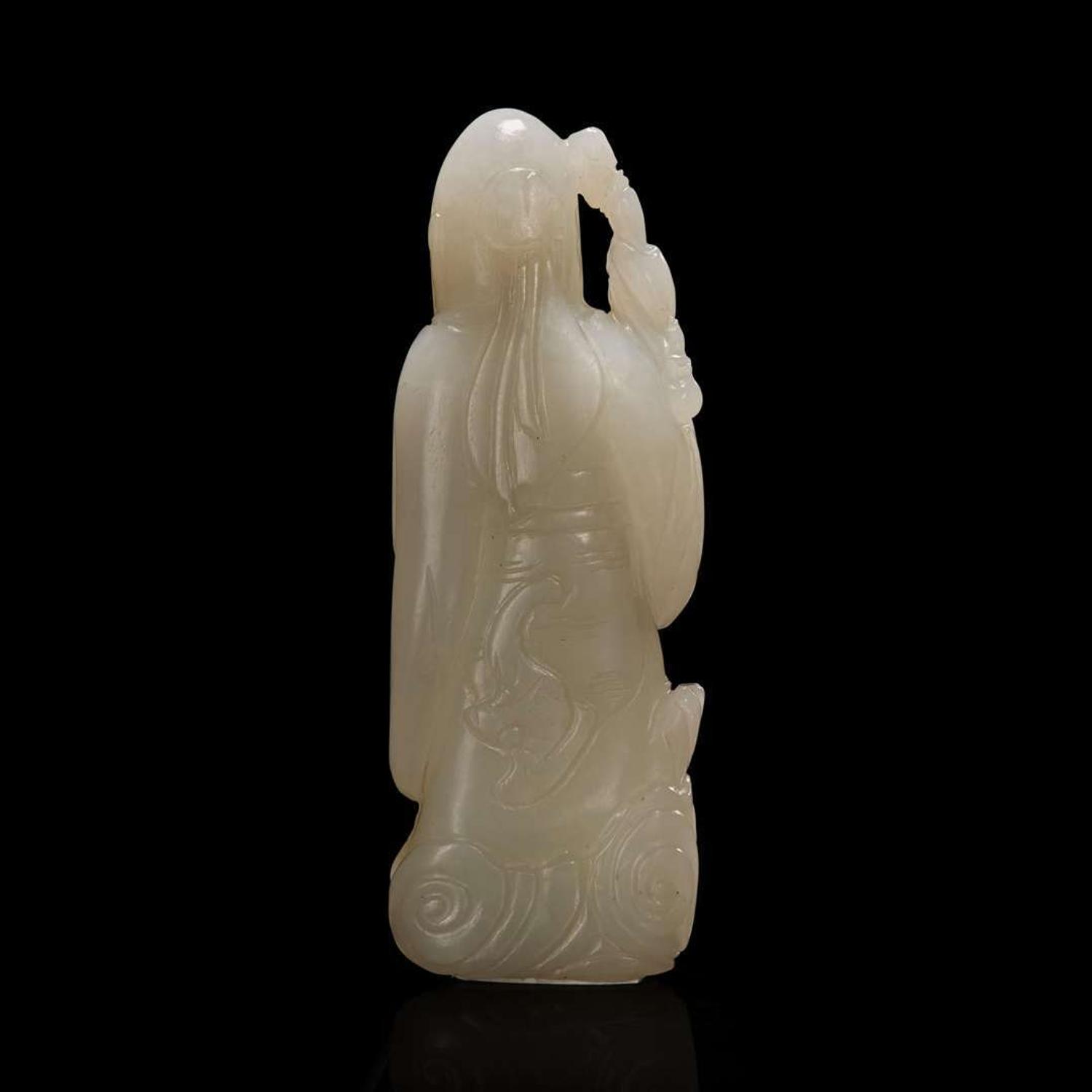 A Chinese pale celadon jade figure of Shoulao 青白玉壽老