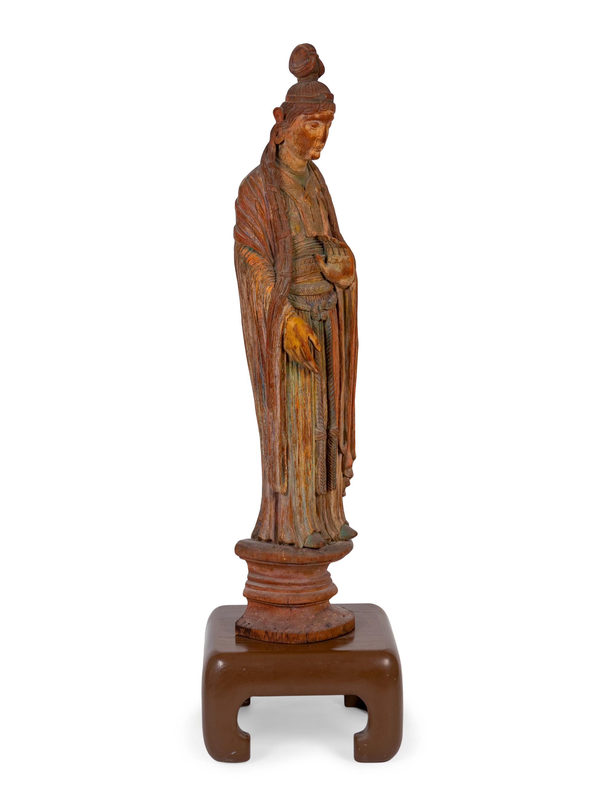 A Chinese Carved and Polychromed Hardwood Figure of Quan Yin — LATE 19TH / EARLY 20TH CENTURY