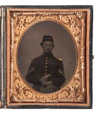 [CIVIL WAR]. Sixth plate tintype of a Union sergeant holding a Sharps four-barrel pistol.