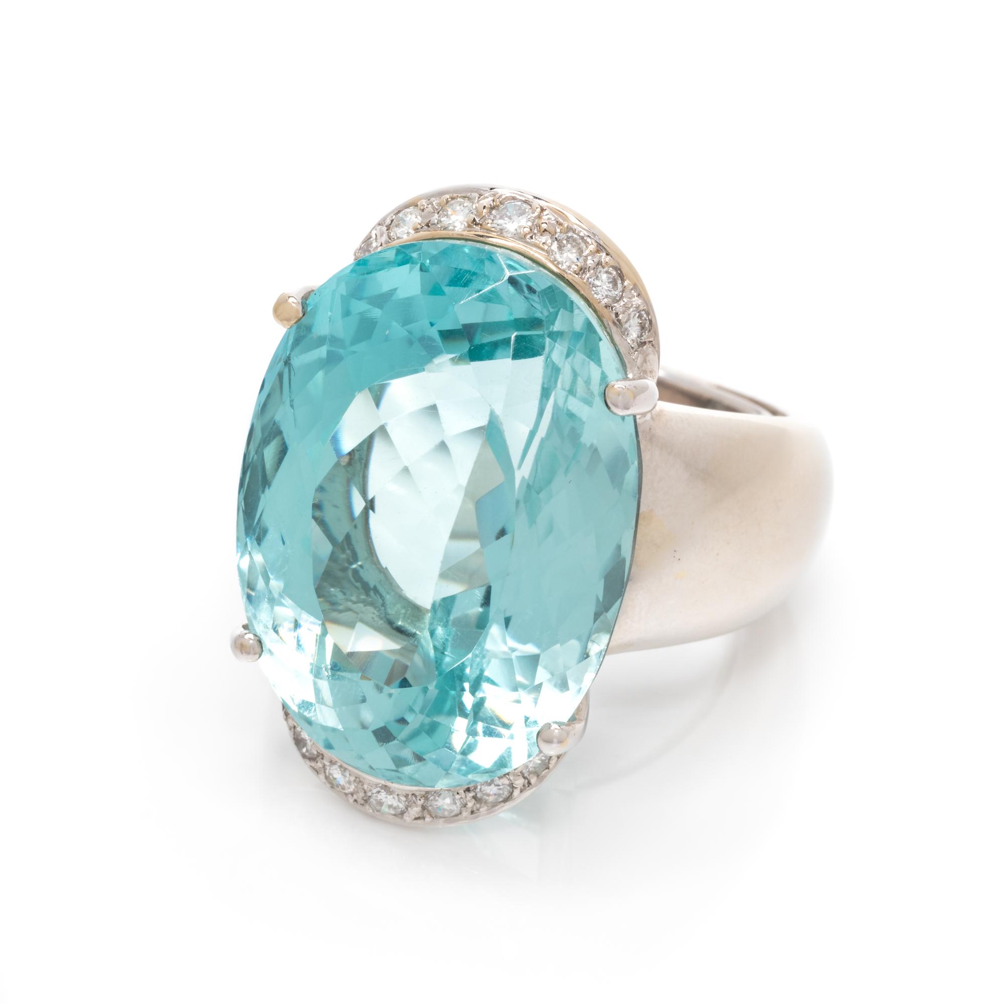 BLUE TOPAZ AND DIAMOND RING