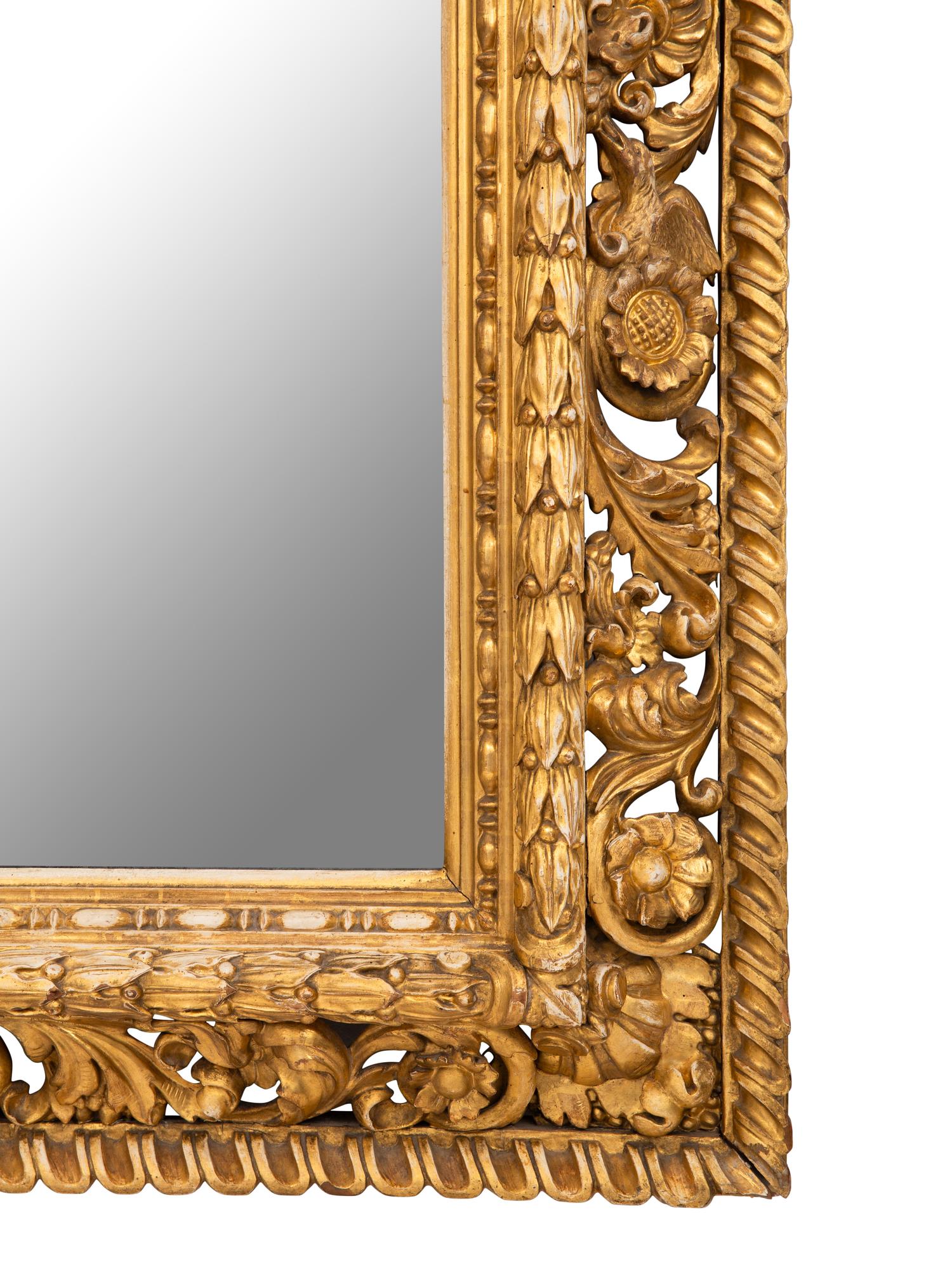 An Italian Baroque Style Giltwood Mirror