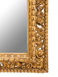 An Italian Baroque Style Giltwood Mirror