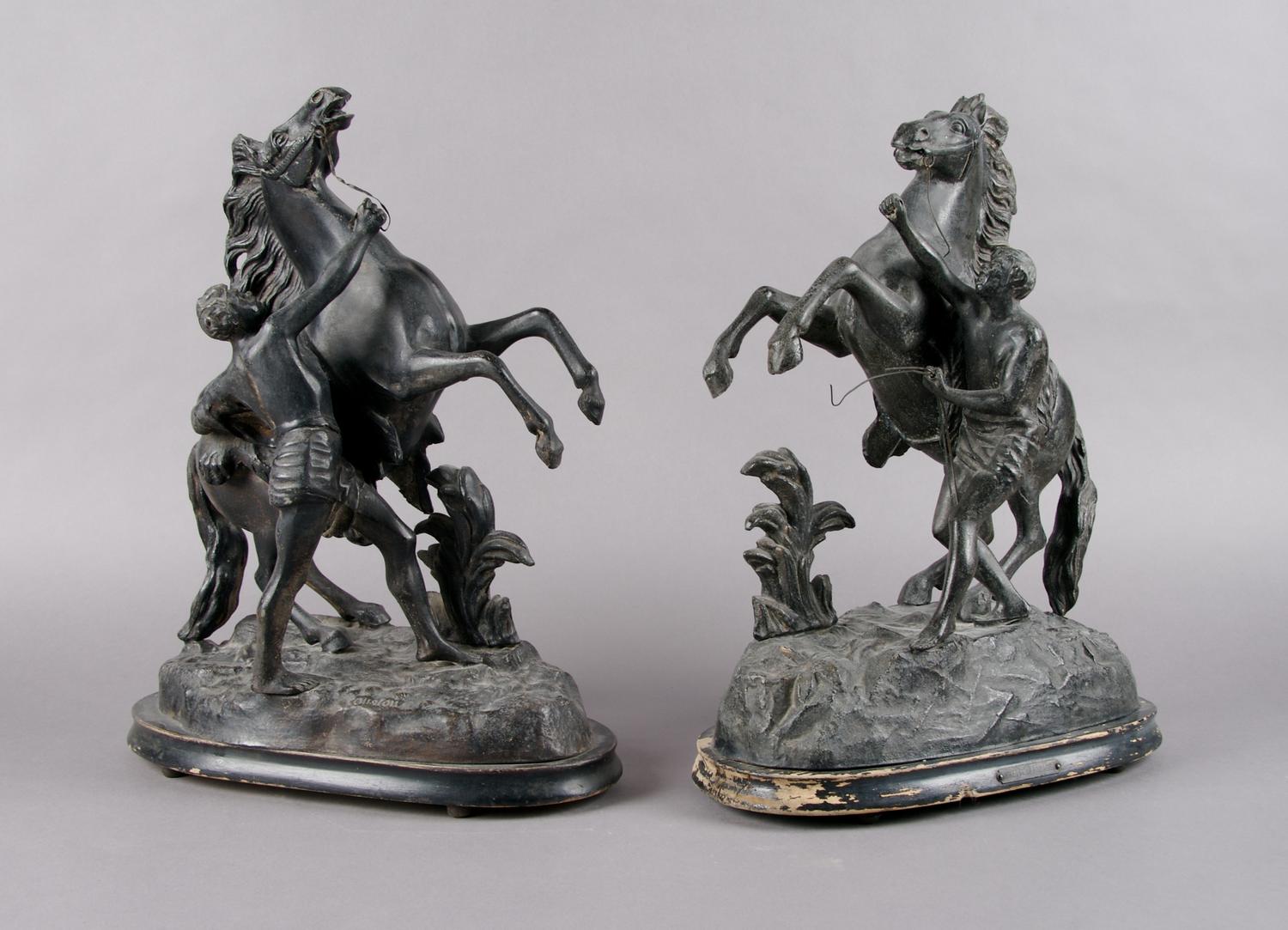A Pair of Cast Metal Figural Groups, Height overall 17 inches.