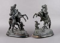 A Pair of Cast Metal Figural Groups, Height overall 17 inches.