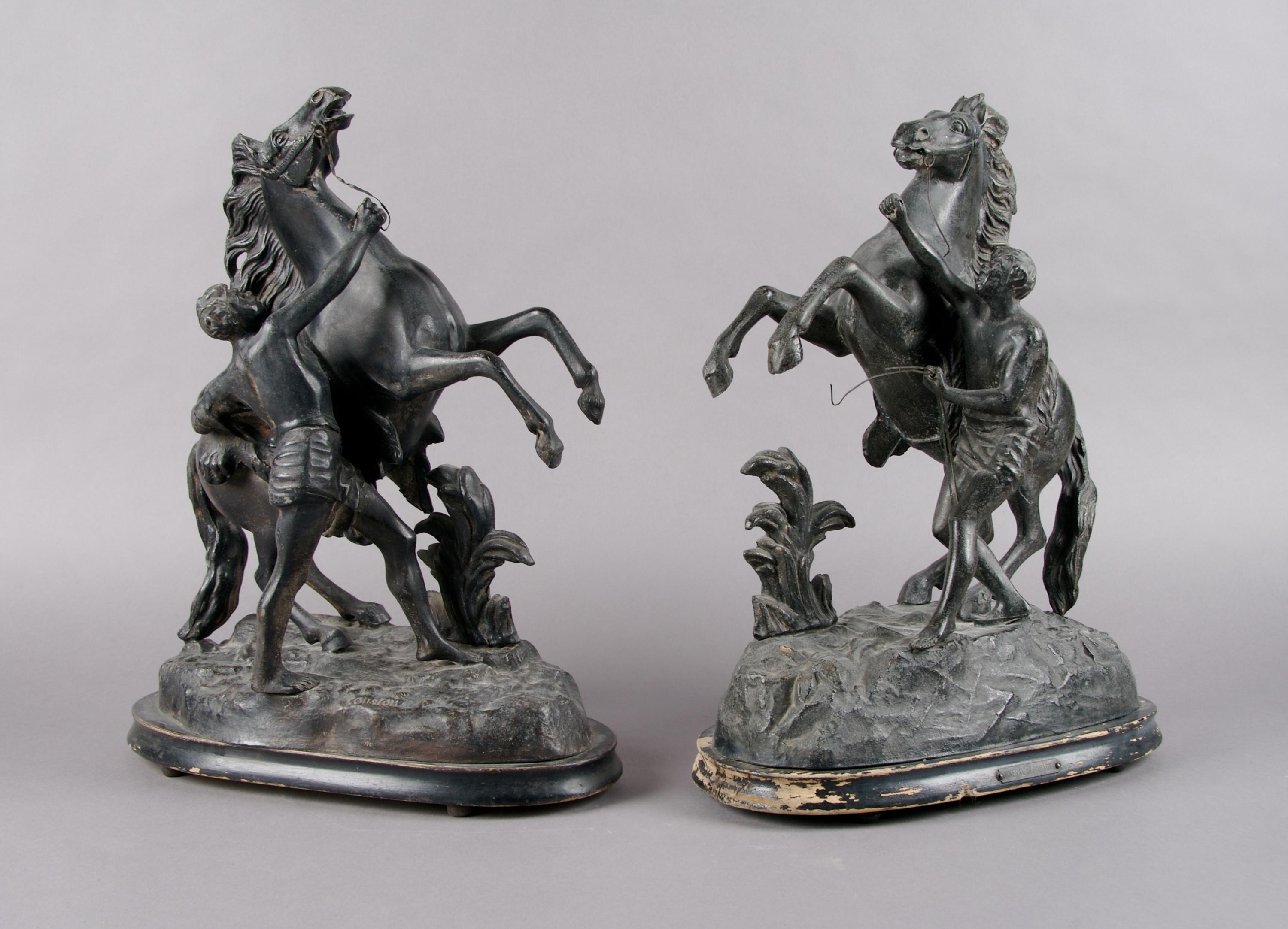 A Pair of Cast Metal Figural Groups, Height overall 17 inches.