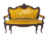 A Rococo Revival Carved Walnut Settee