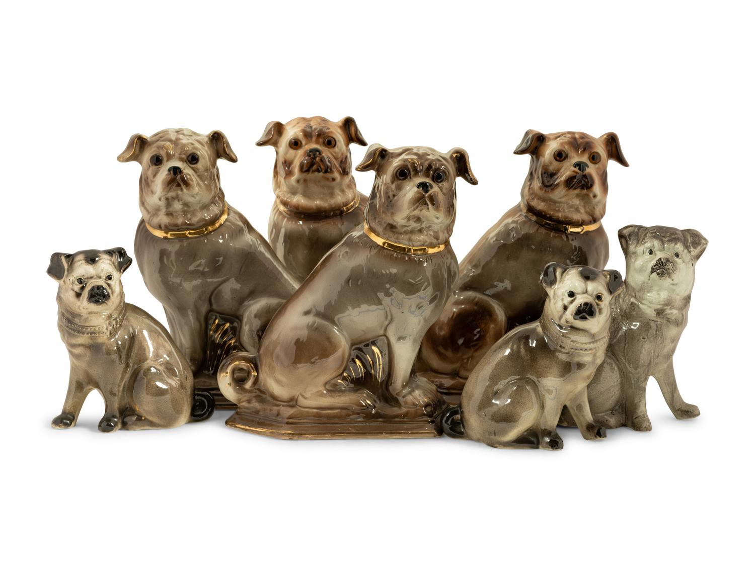 A Group of Staffordshire and Other Models of Pugs