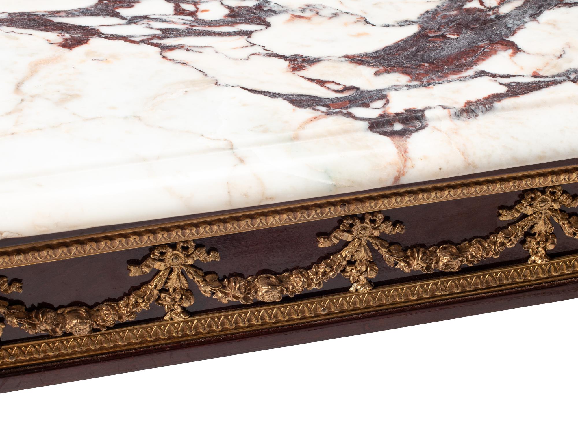 A Louis XVI Style Gilt Bronze Mounted Mahogany Marble-Top Low Table