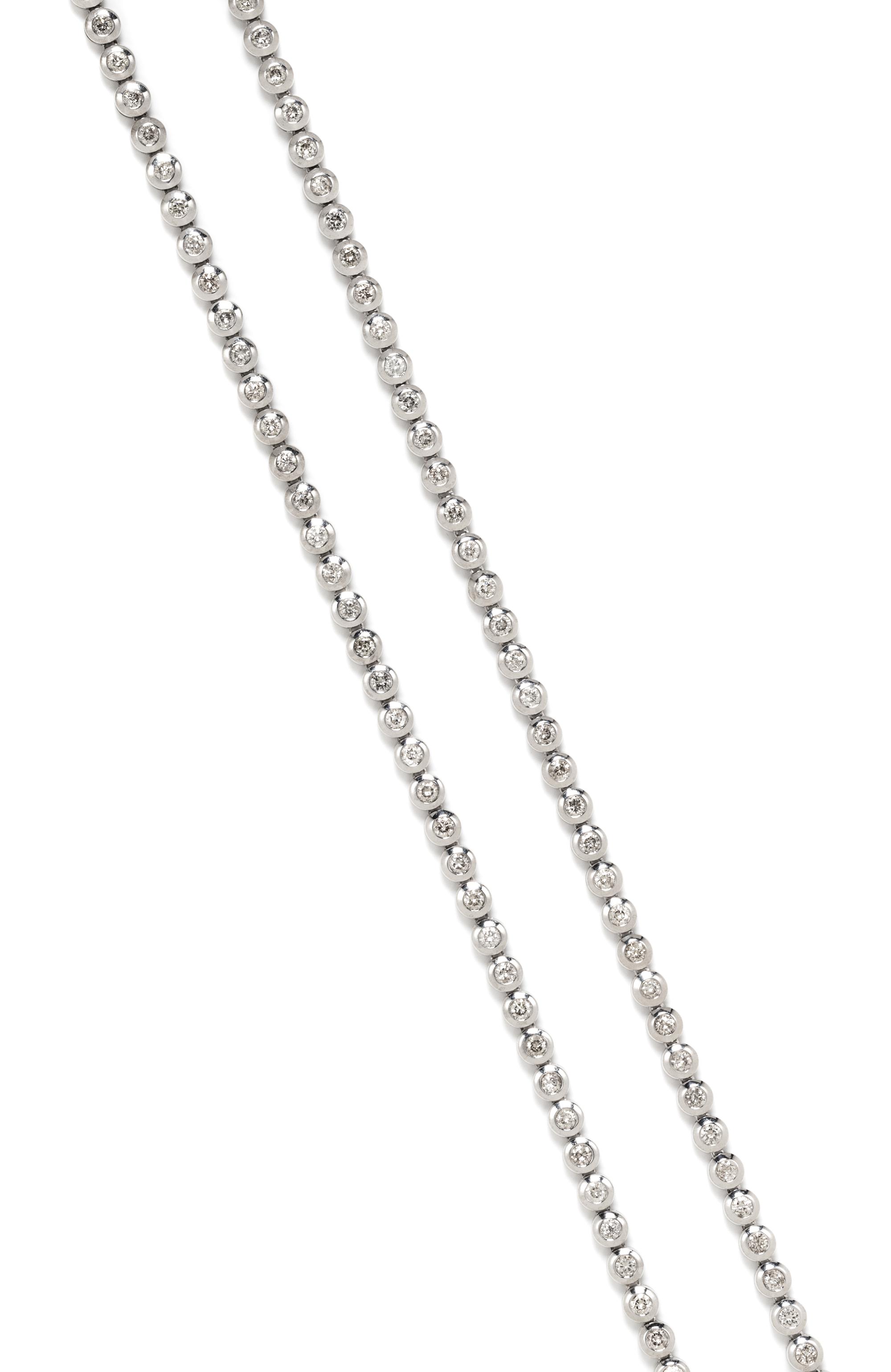 A 14 Karat White Gold and Diamond Longchain Riviere Necklace, 62.30 dwts.