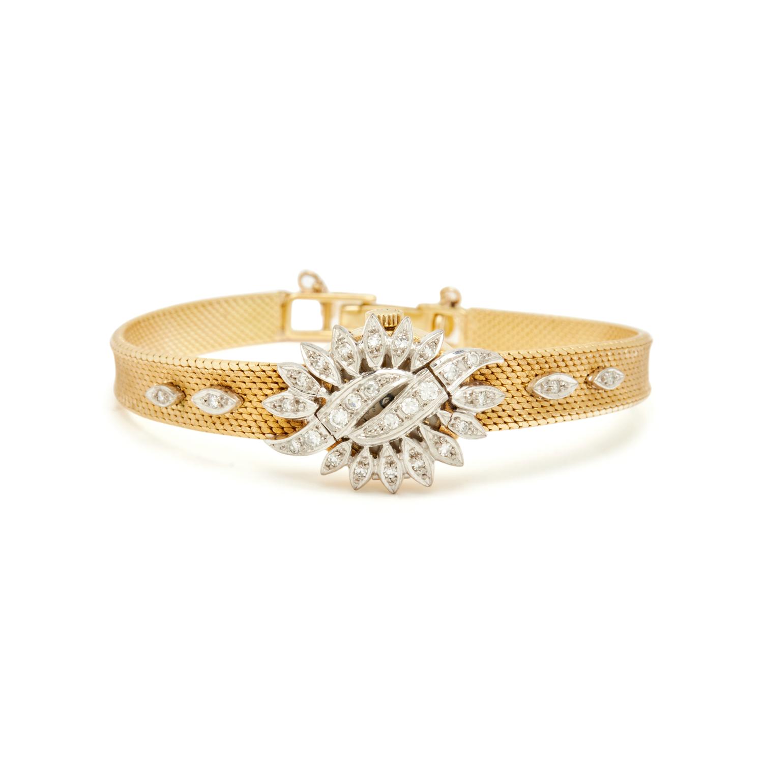 CHOPARD, 18K YELLOW GOLD AND DIAMOND HIDDEN DIAL WATCH
