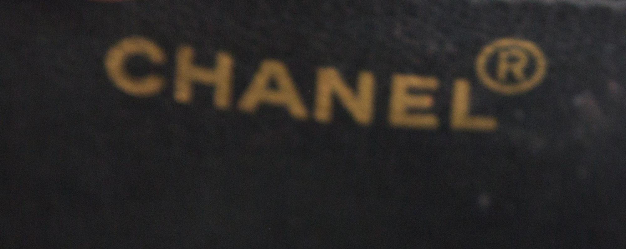 A Chanel Black Caviar Quilted Small Flap Bag, 7" x 5" x 2"; Strap drop: 21".