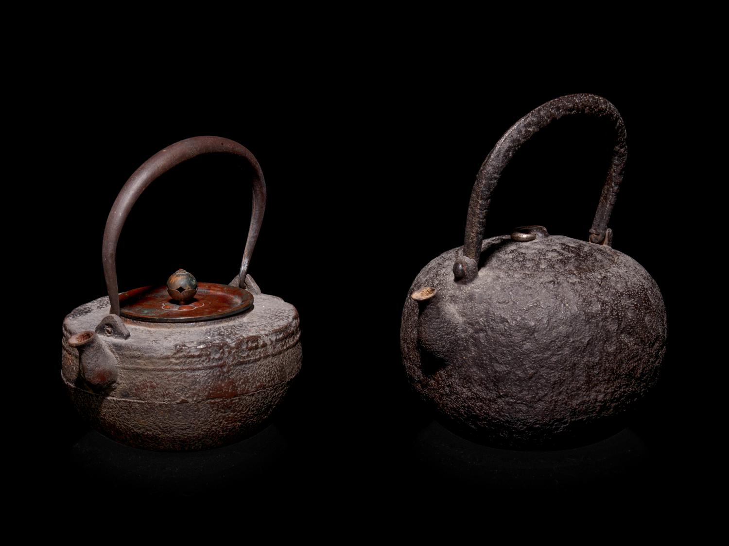 Seven Japanese Cast Iron Teapots, Tetsubin, and Burner