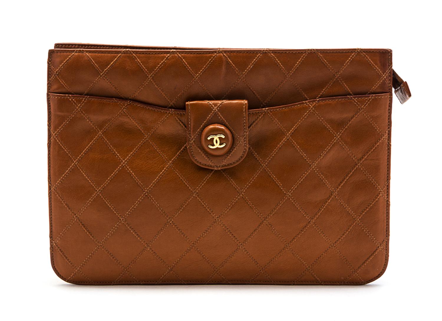 A Chanel Cognac Quilted Leather Clutch, 10 x 7 1/2 x 1 1/2 inches.