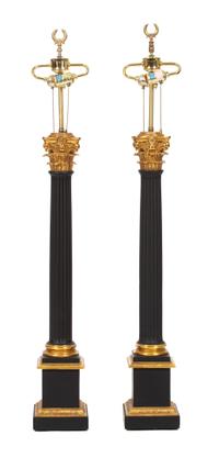 A Pair of Neoclasscial Style Ebonized and Gilt Metal Columnar Table Lamps Height 46 inches. — 20TH CENTURY