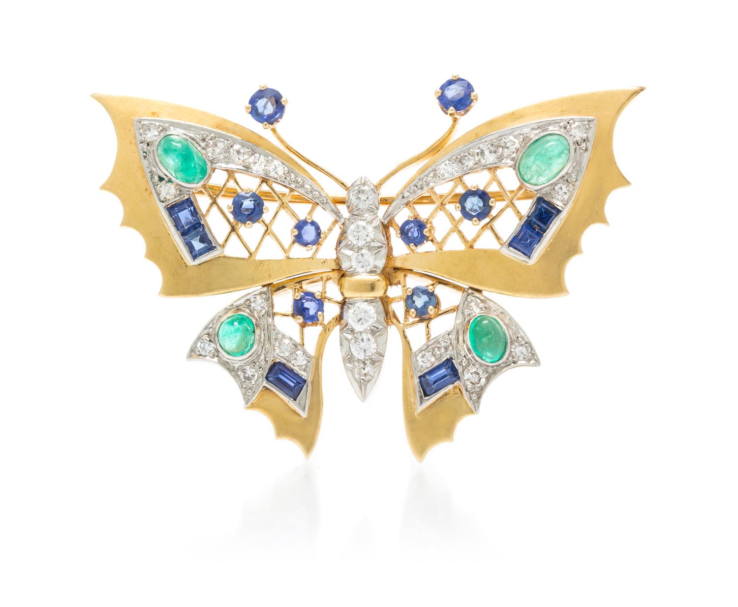 A Vintage Platinum Topped Gold, Sapphire, Emerald and Diamond Butterfly Brooch, 7.50 dwts.