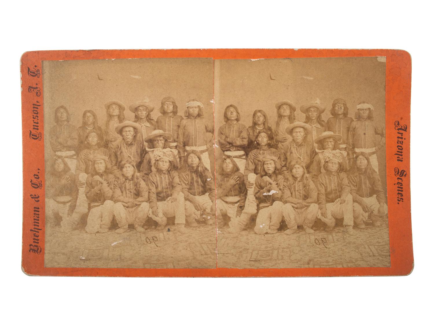 [NATIVE AMERICANS]. BUEHMAN, Henry (1851-1912), photographer. Stereoview of a group of Apache Scouts. Tucson, AZ: ca 1880-85.