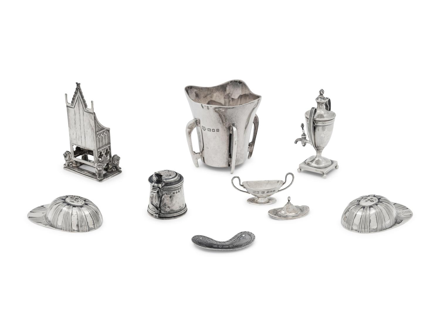 A Collection of Eight English Silver Miniature and Diminutive Articles