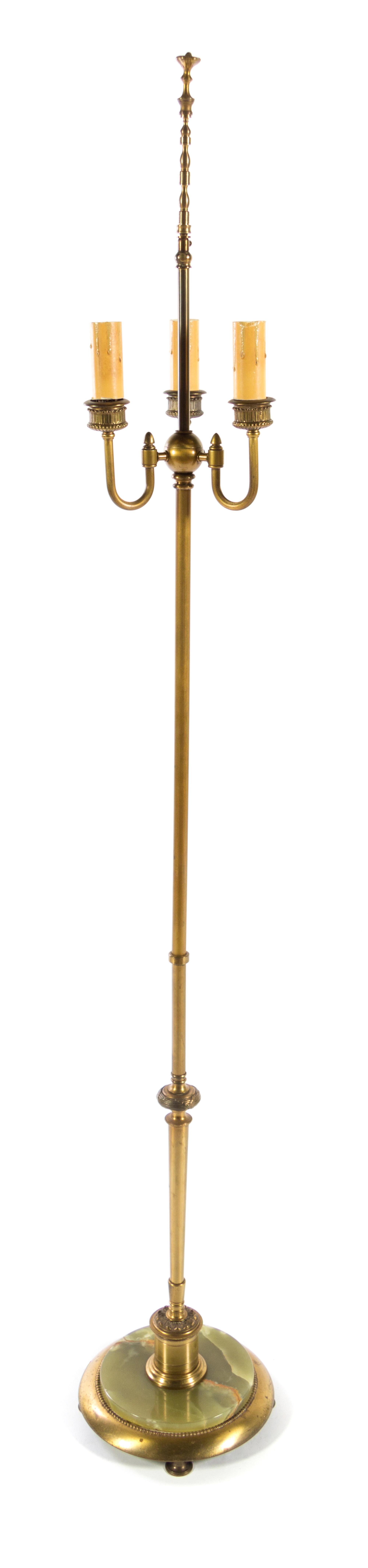 A Brass and Onyx Floor Lamp Height overall 64 1/2 inches.