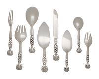 A Group of Eight Georg Jensen Silver Ornamental Serving Articles