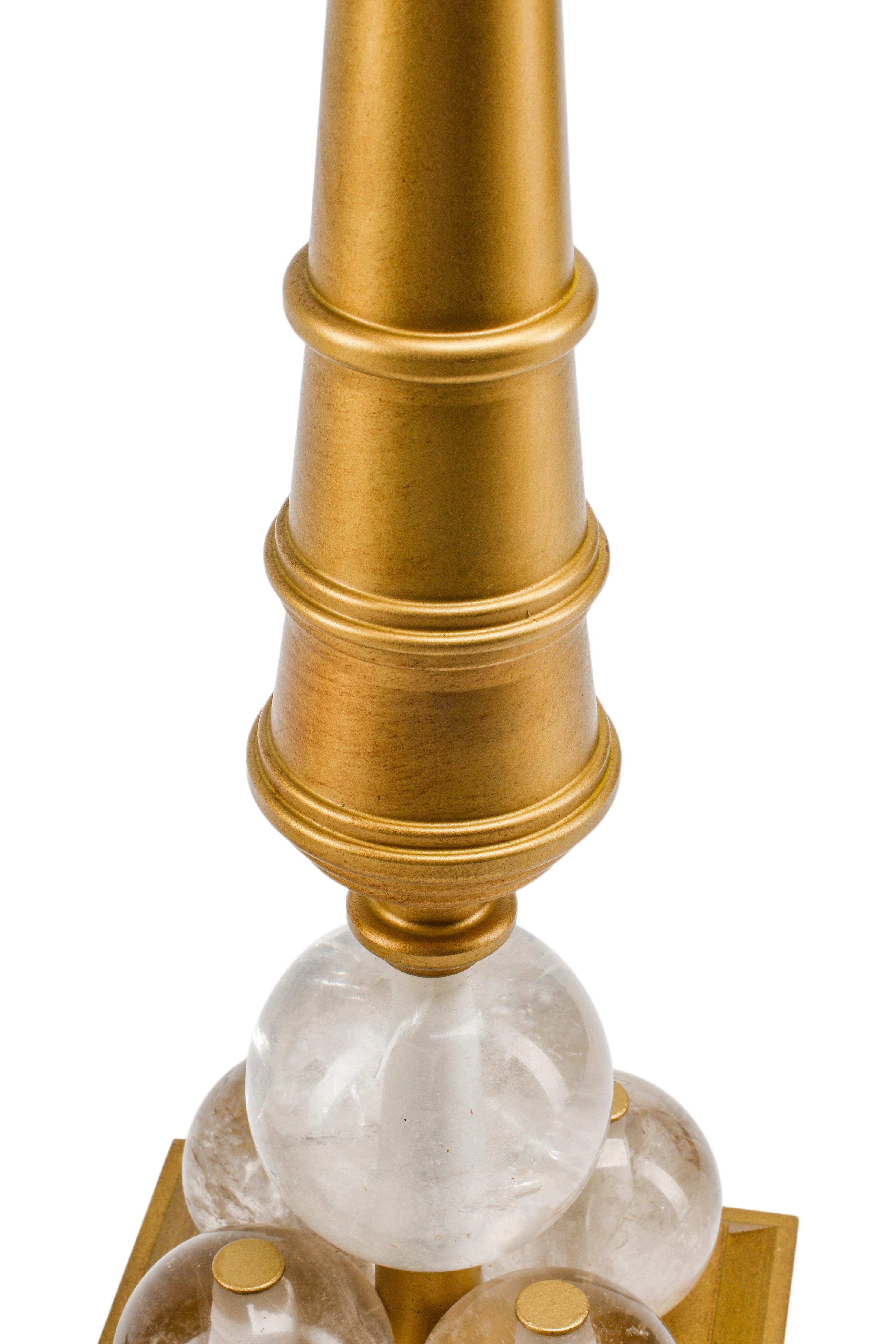 A Pair of Gilt Bronze and Rock Crystal Cannon-Motif Candlesticks