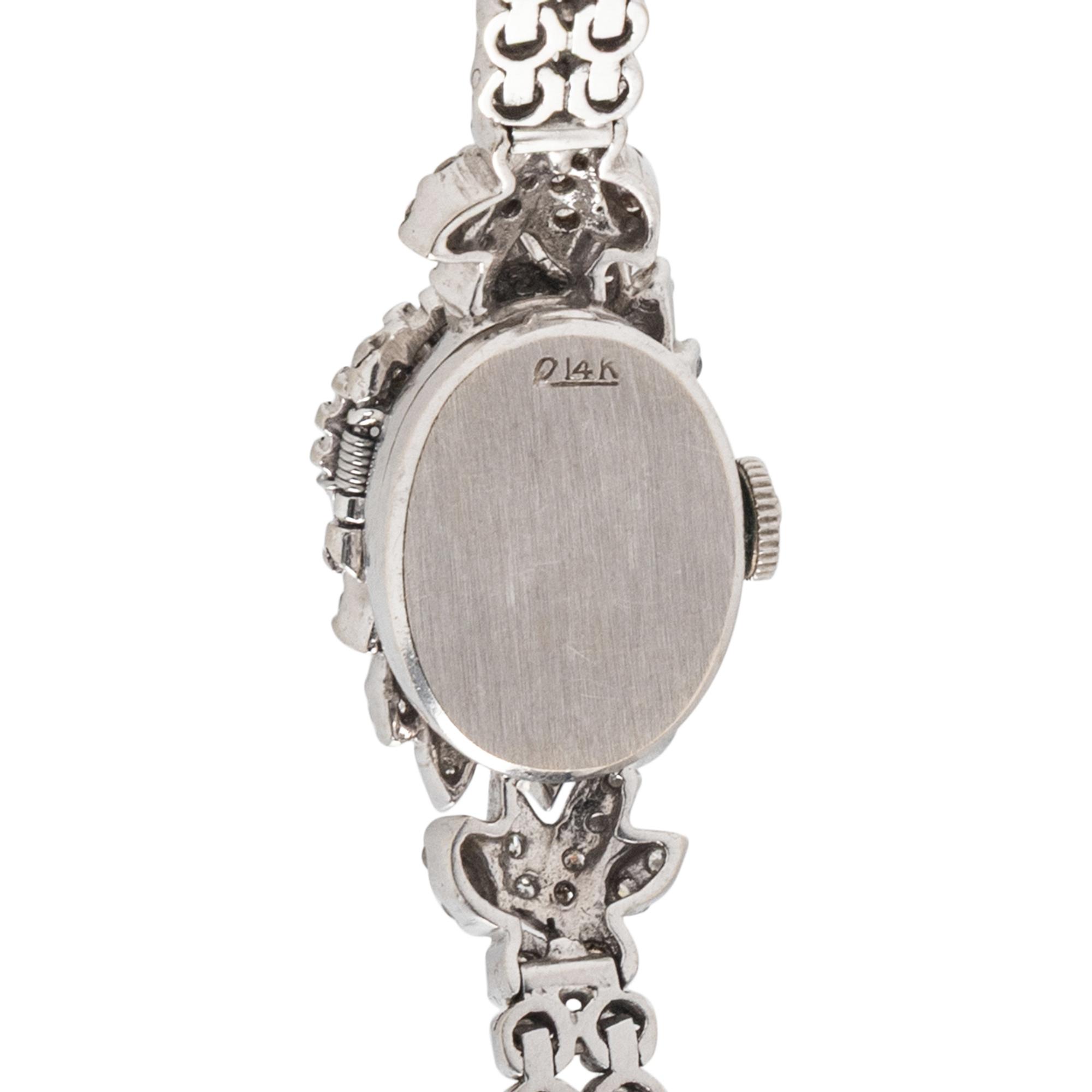 HAMILTON, DIAMOND AND 14K WHITE GOLD SURPRISE WATCH