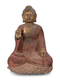 A Chinese Carved Stone Seated Buddha with Polychrome Decoration