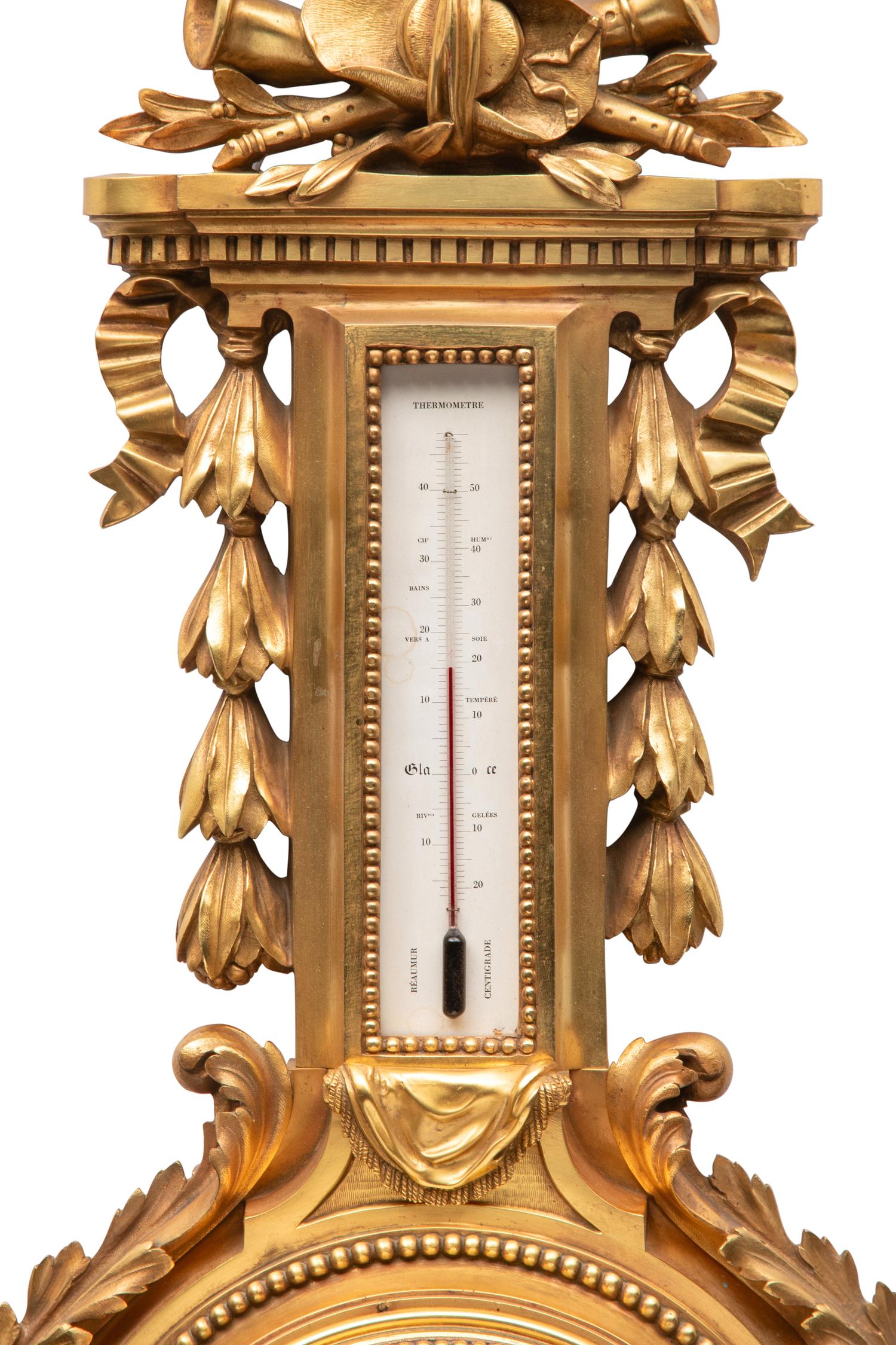 A French Gilt Bronze Clock and Barometer