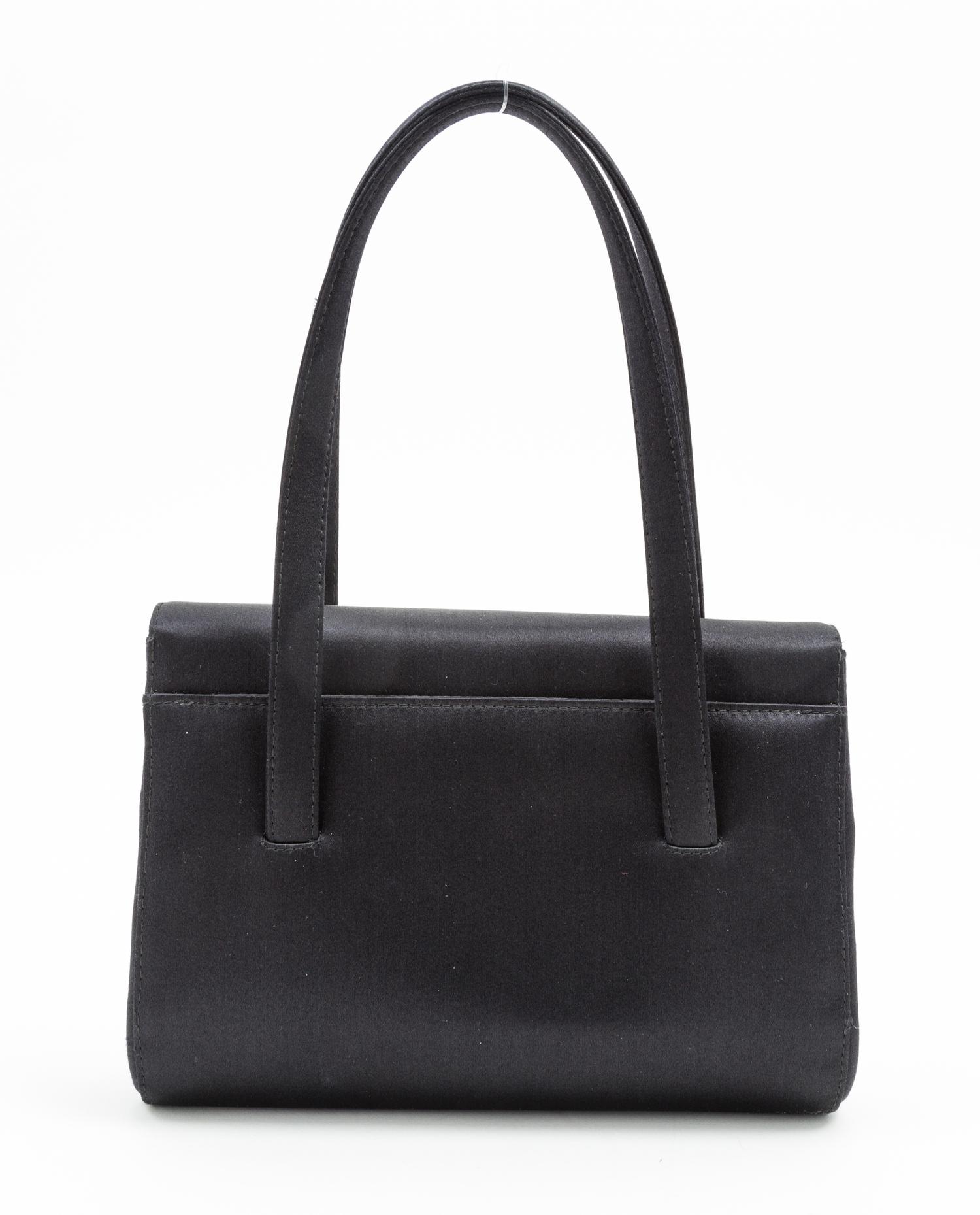 A Chanel Black Satin Small Flap Handbag, 7.5" x 5.5" x 1.75"; Handle drop: 5.5".