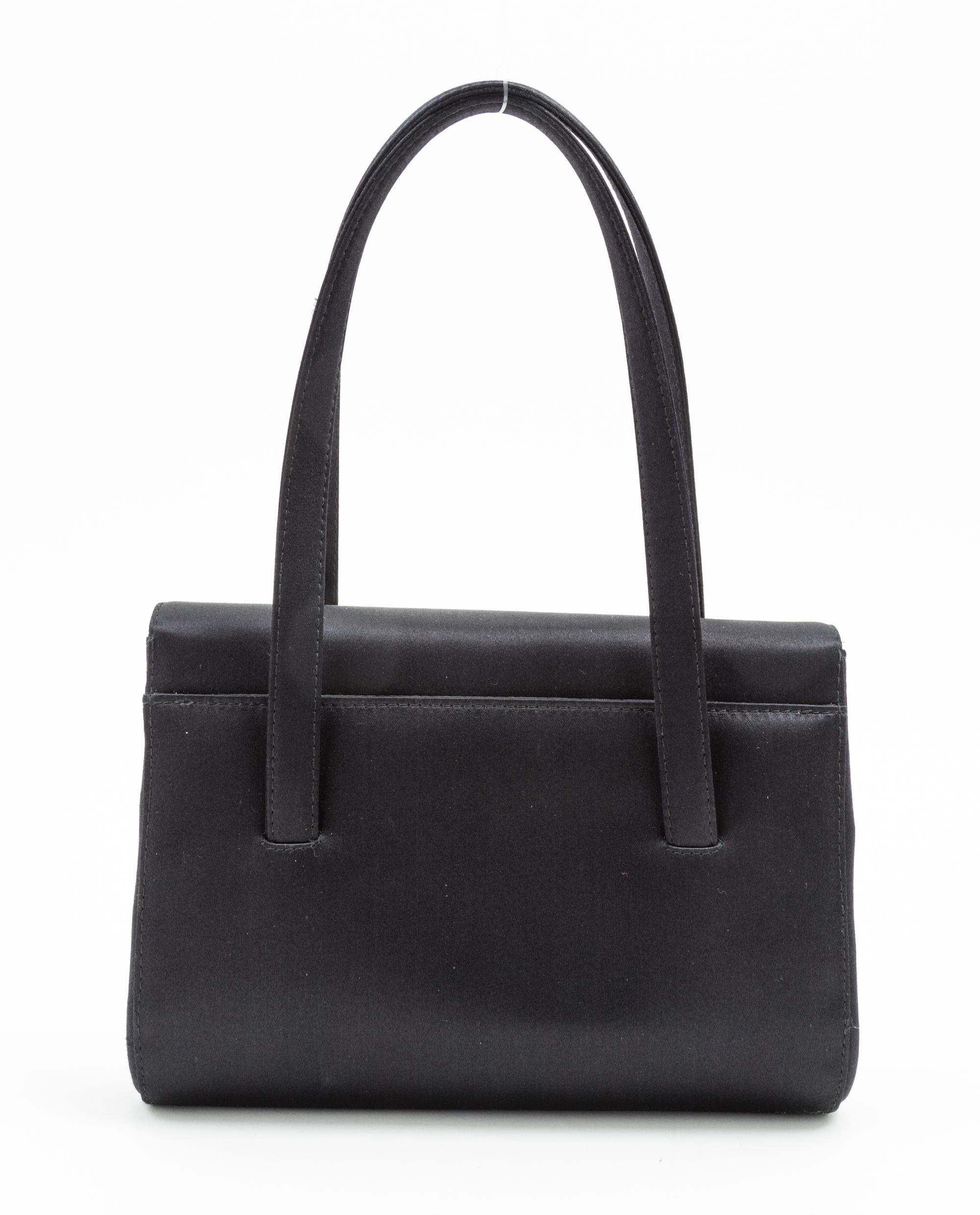 A Chanel Black Satin Small Flap Handbag, 7.5" x 5.5" x 1.75"; Handle drop: 5.5".