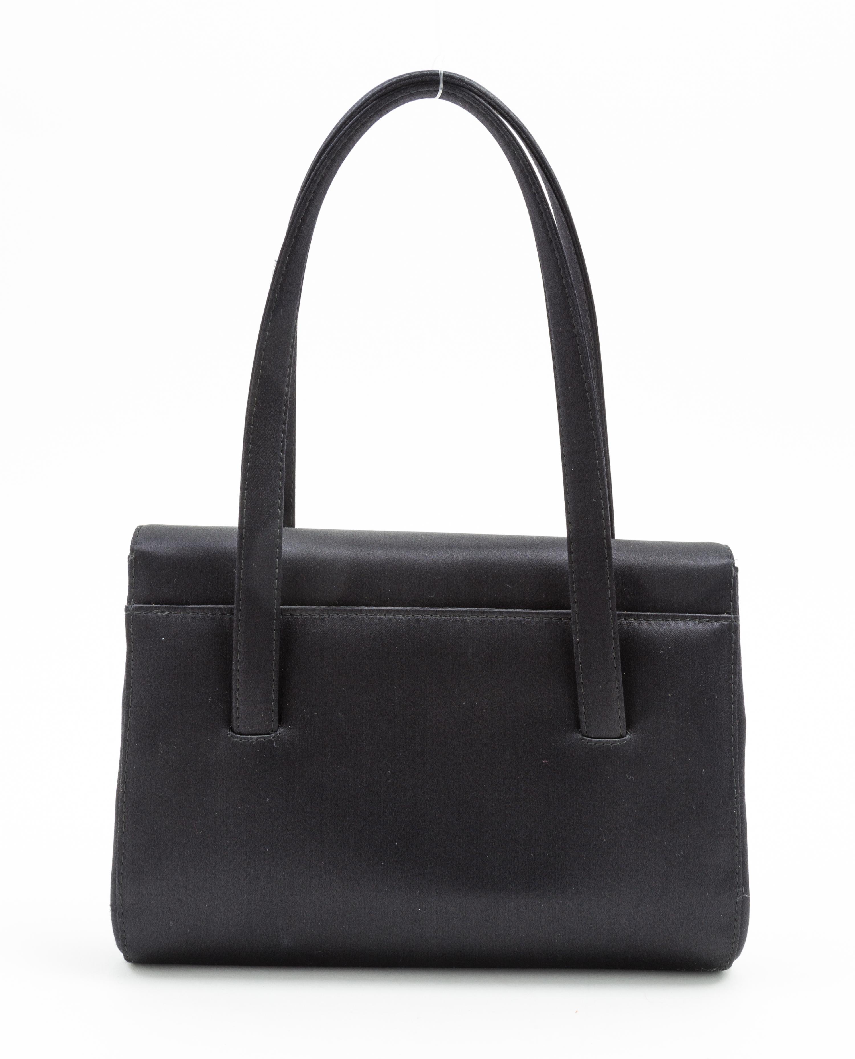 A Chanel Black Satin Small Flap Handbag, 7.5" x 5.5" x 1.75"; Handle drop: 5.5".