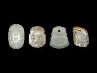 Four Chinese Celadon Carved Jade Plaques