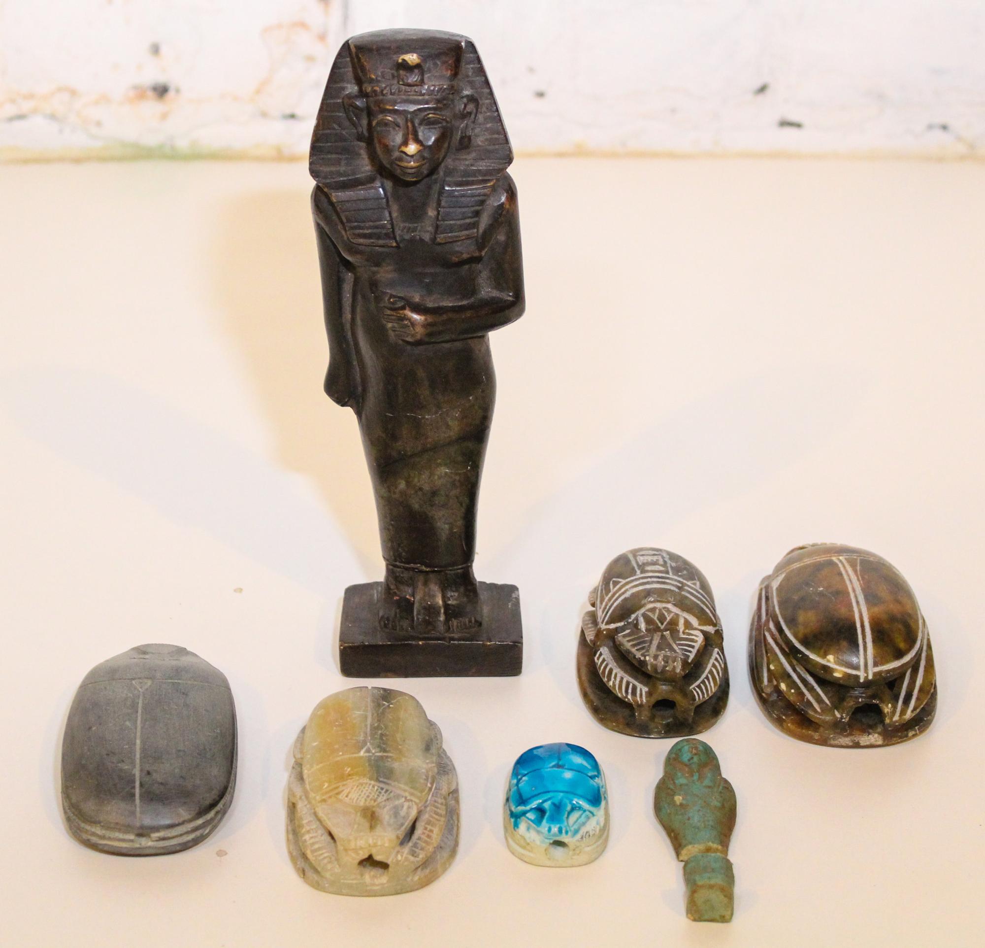 A Collection of Egyptian Carved Stone Articles Height of tallest 9 inches.