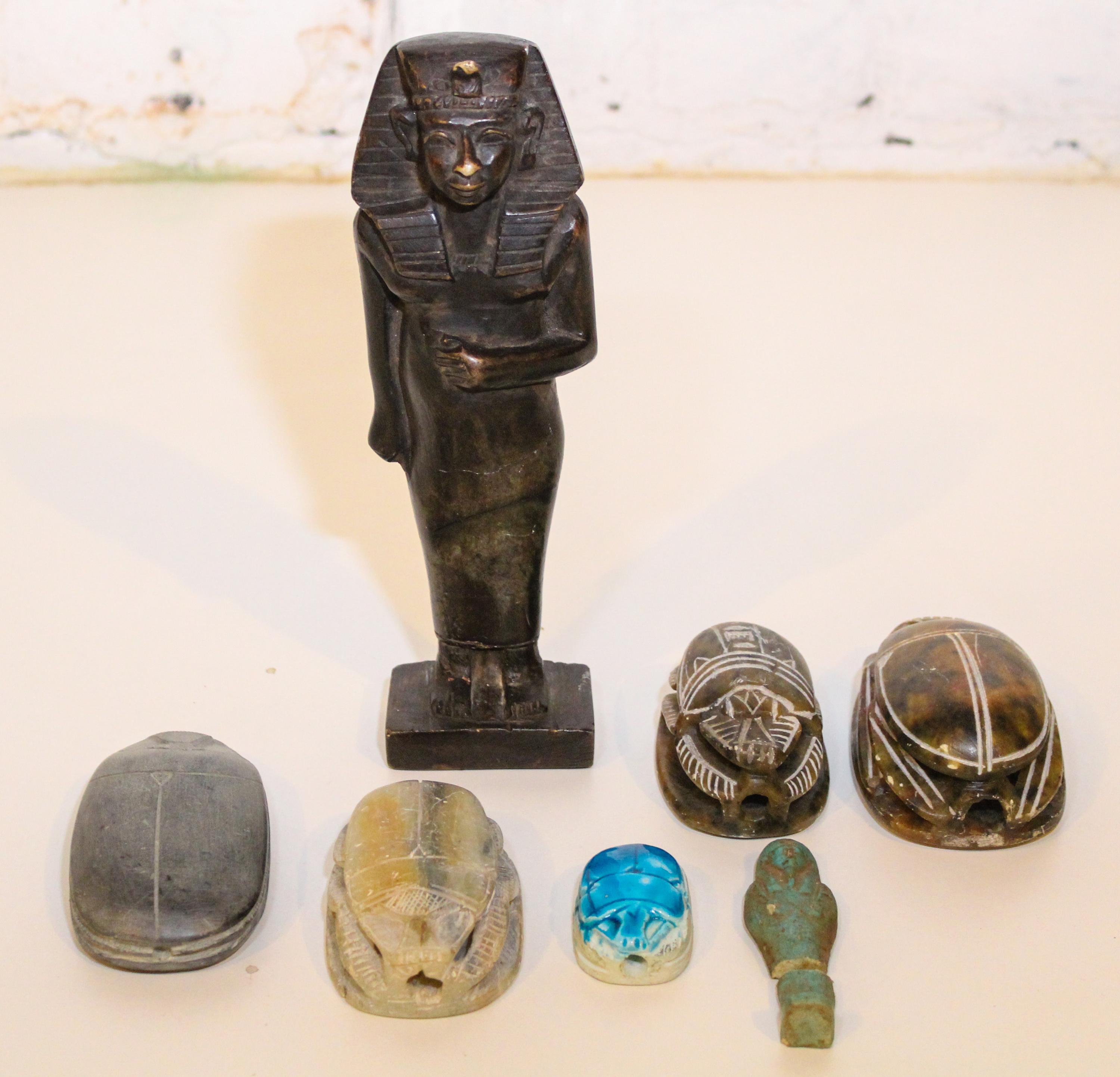 A Collection of Egyptian Carved Stone Articles Height of tallest 9 inches.