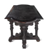 An Italian Renaissance Style Ebonized Library Table