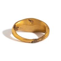 A Greek Gold and Garnet Finger Ring with a Prancing Stag