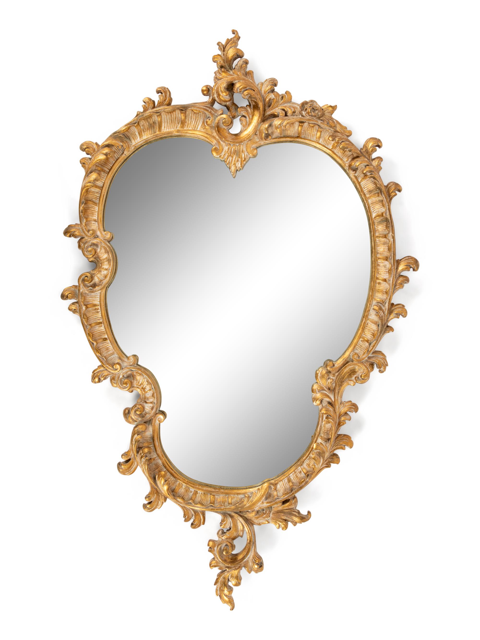 A Rococo Style Giltwood Mirror