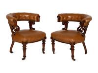 A Pair of William IV Style Leather-Upholstered Mahogany Armchairs