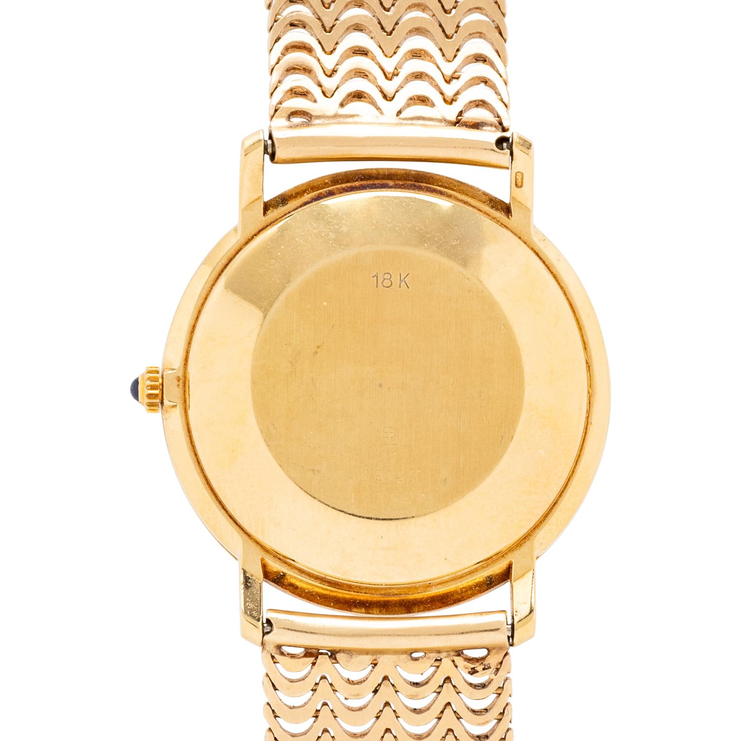 CORUM, REF. 89127 18K YELLOW GOLD DATE WATCH