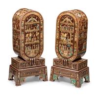 A Pair of Egyptian Style Painted and Inlaid Cabinets