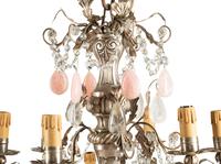 An Italian Silvered Tôle, Rose Quartz and Rock Crystal Twelve-Light Chandelier