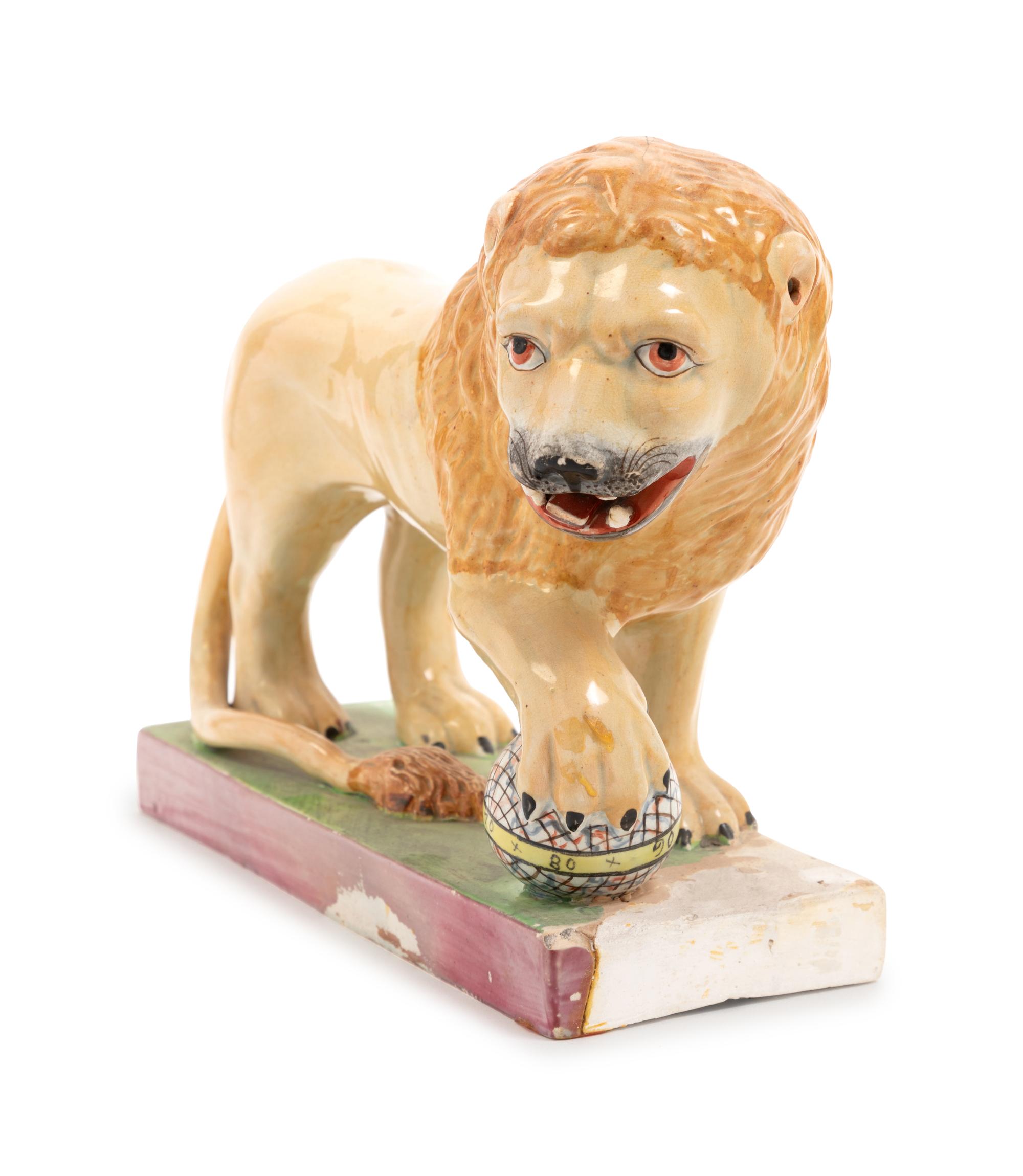 A Staffordshire Pottery Lion