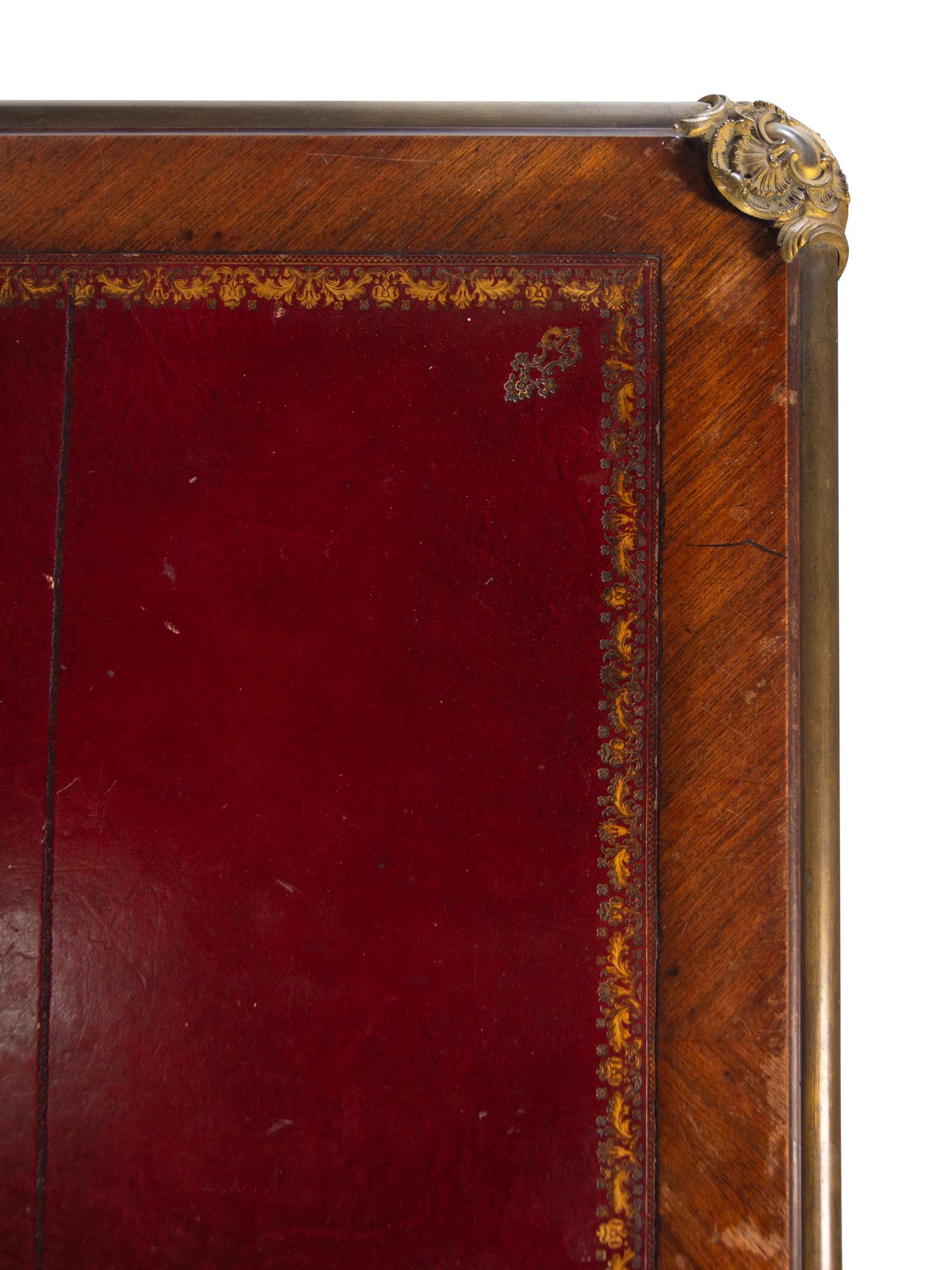 A Louis XV Style Gilt Bronze Mounted Kingwood Bureau Plat