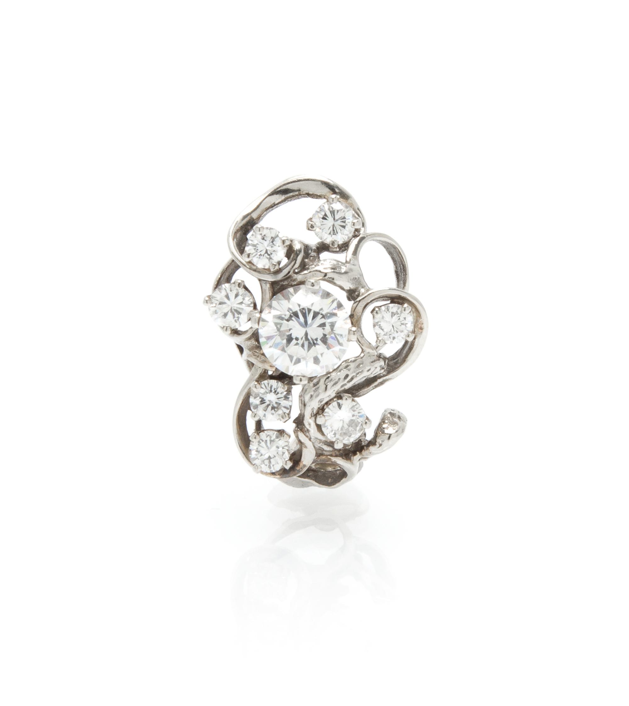 A 14 Karat Gold, Diamond and Cubic Zirconia Assembled Shortener, 4.40 dwts.