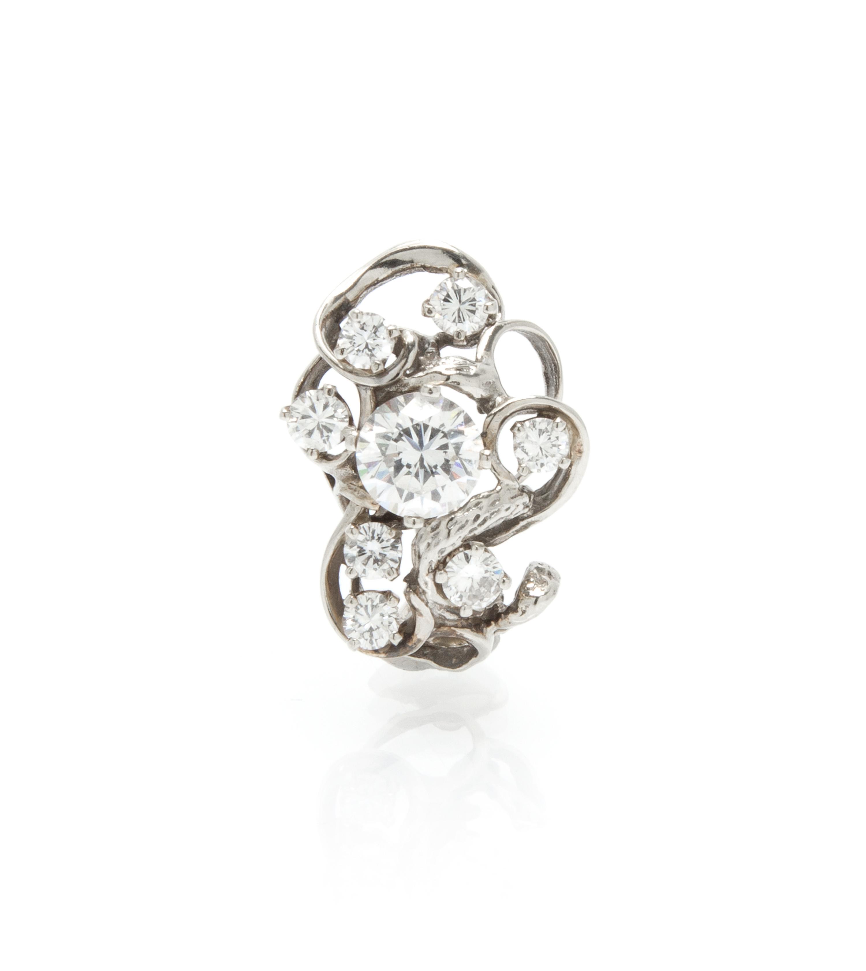 A 14 Karat Gold, Diamond and Cubic Zirconia Assembled Shortener, 4.40 dwts.